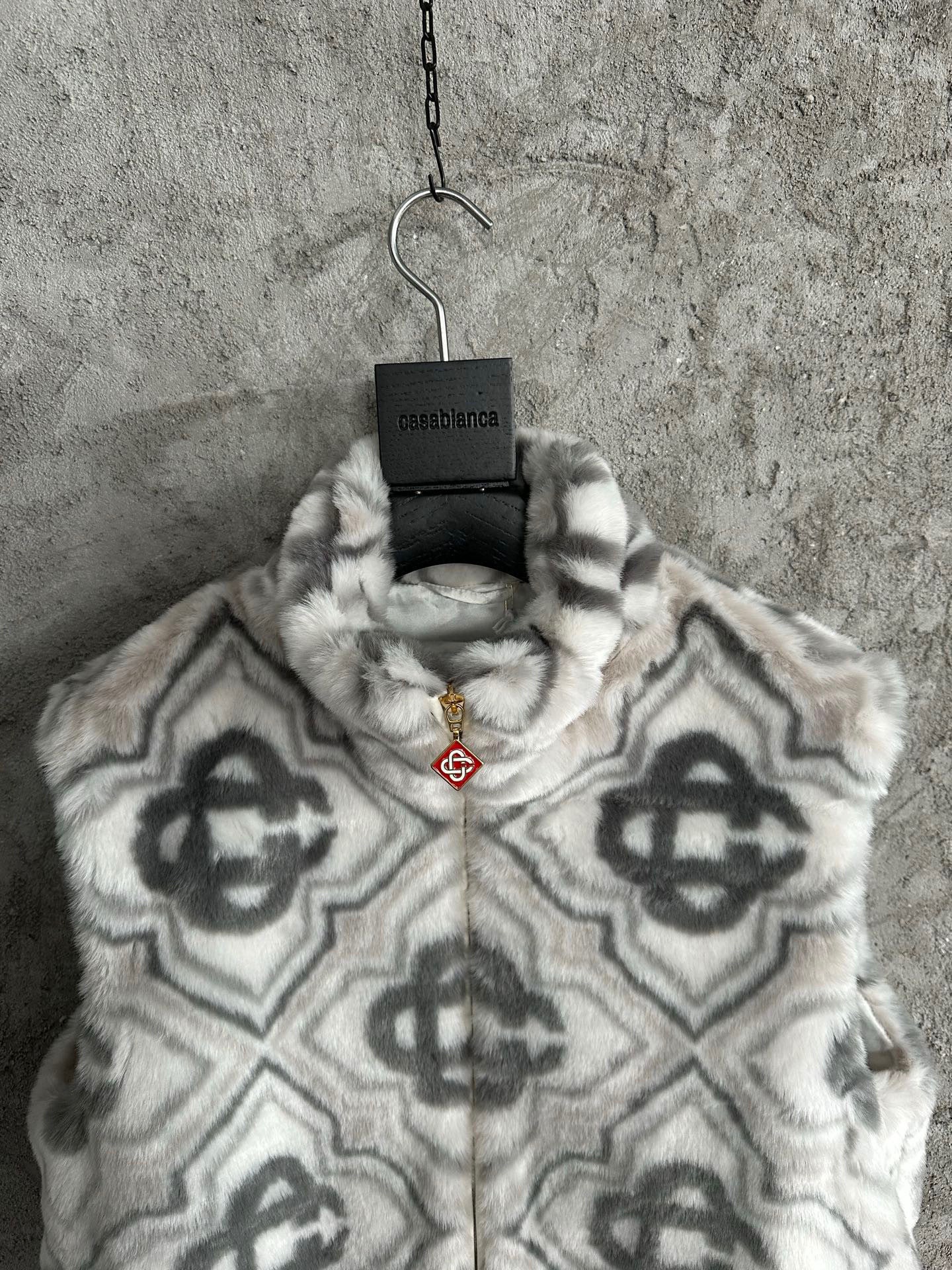Gilet sans manche Monogram Casa