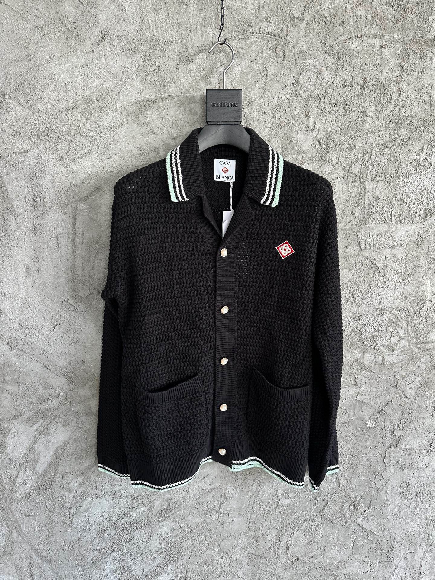 Casa B cardigan en maille à design côtelé